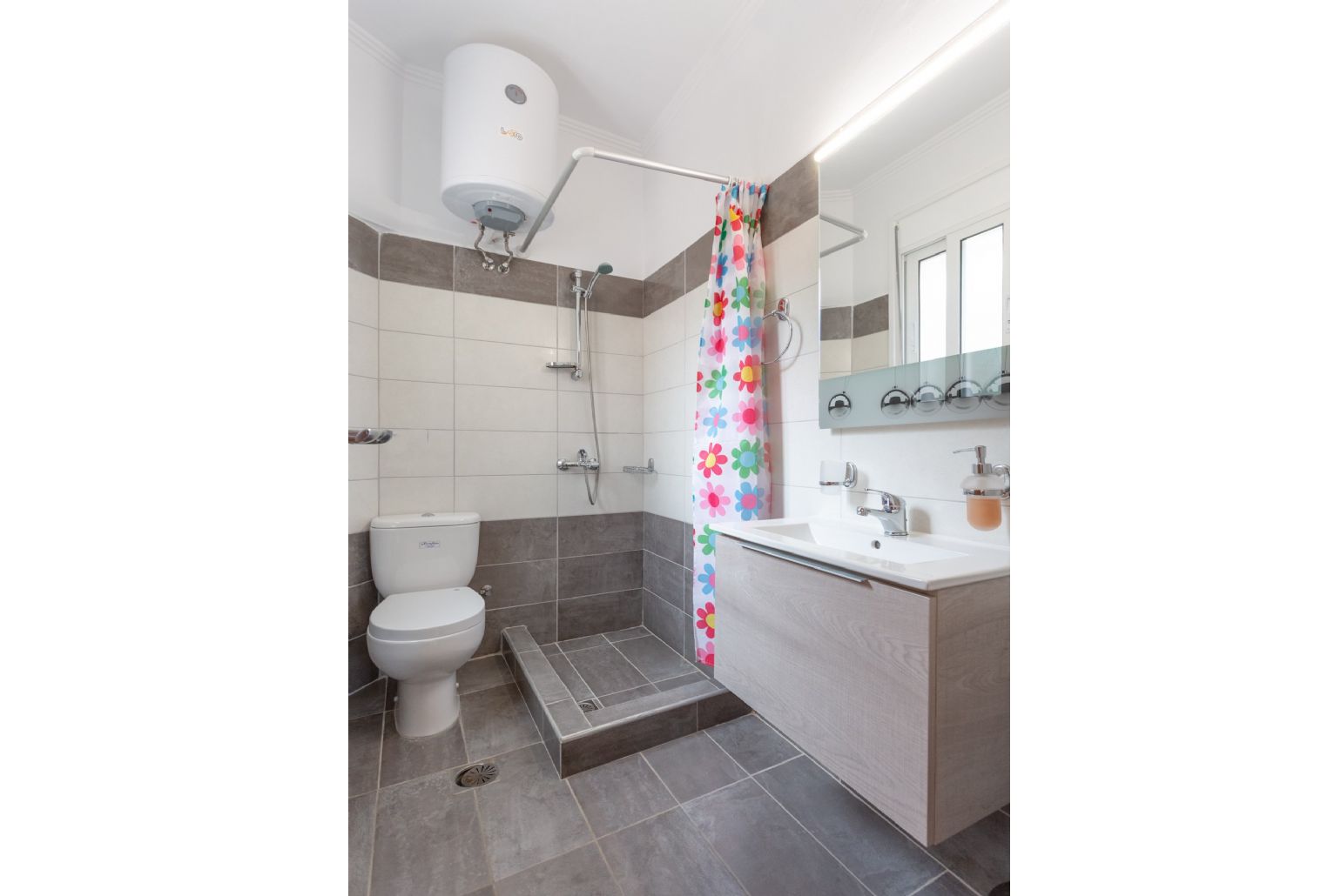 Family bathroom with overhead shower