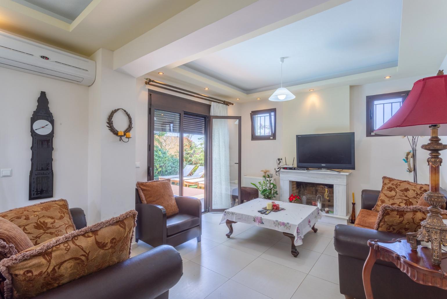 Open-plan living room with dining area, kitchen, A/C, WiFi Internet, Satellite TV, and pool terrace access