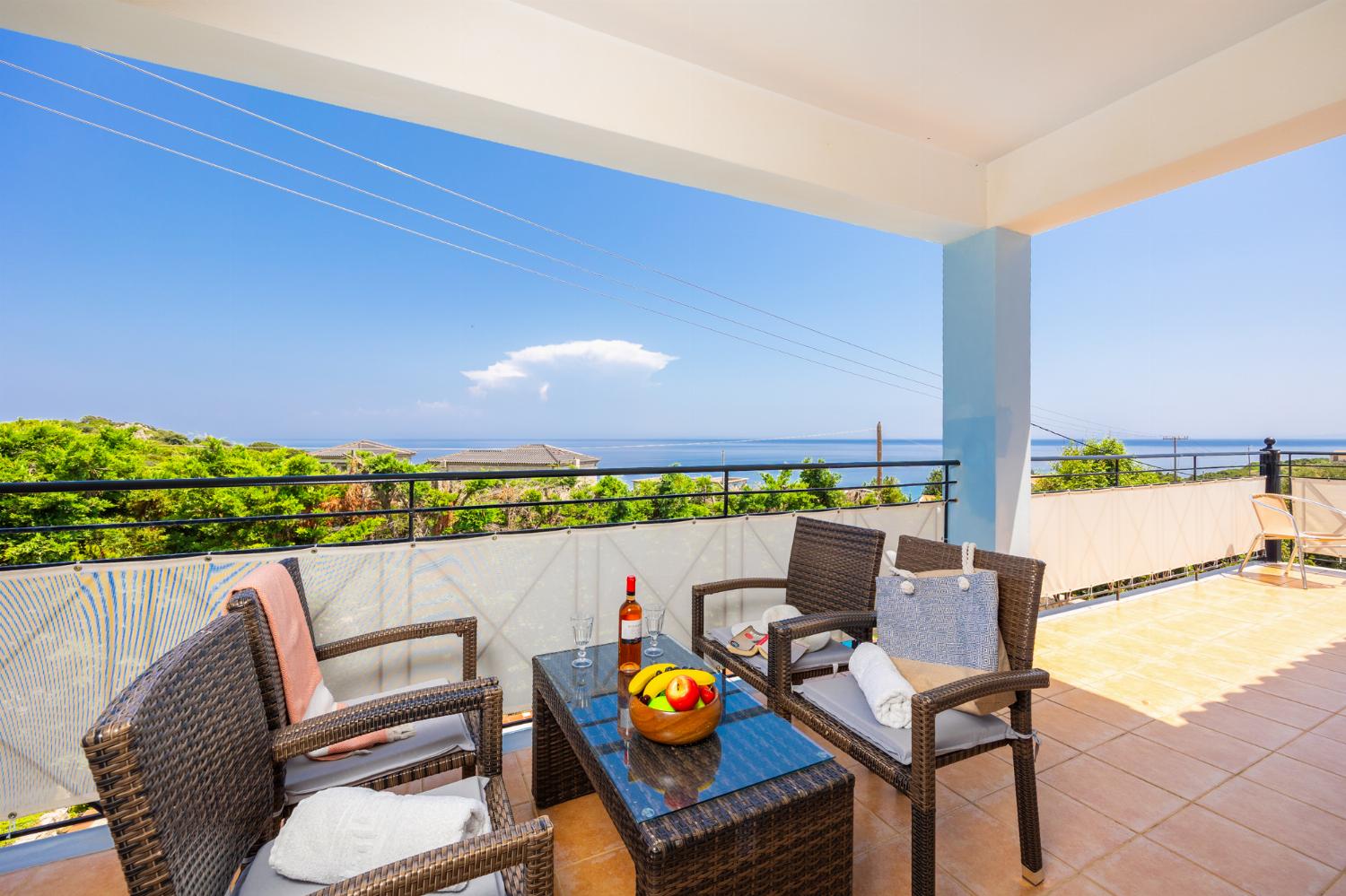 Sheltered balcony area with sea views