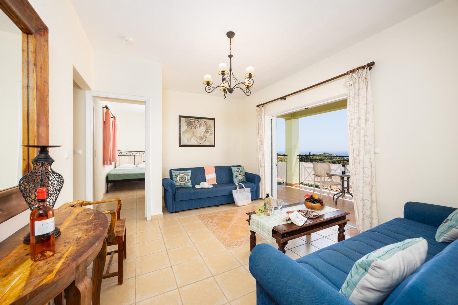 Living room with sofas, A/C, WiFi internet, and sea views