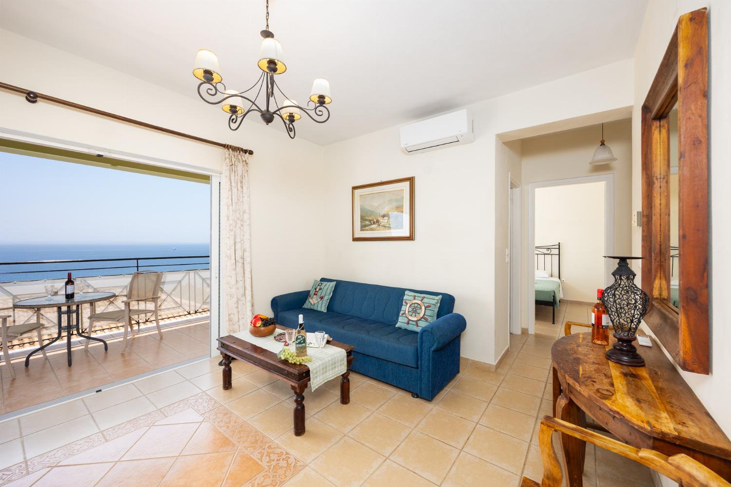 Living room with sofas, A/C, WiFi internet, and sea views