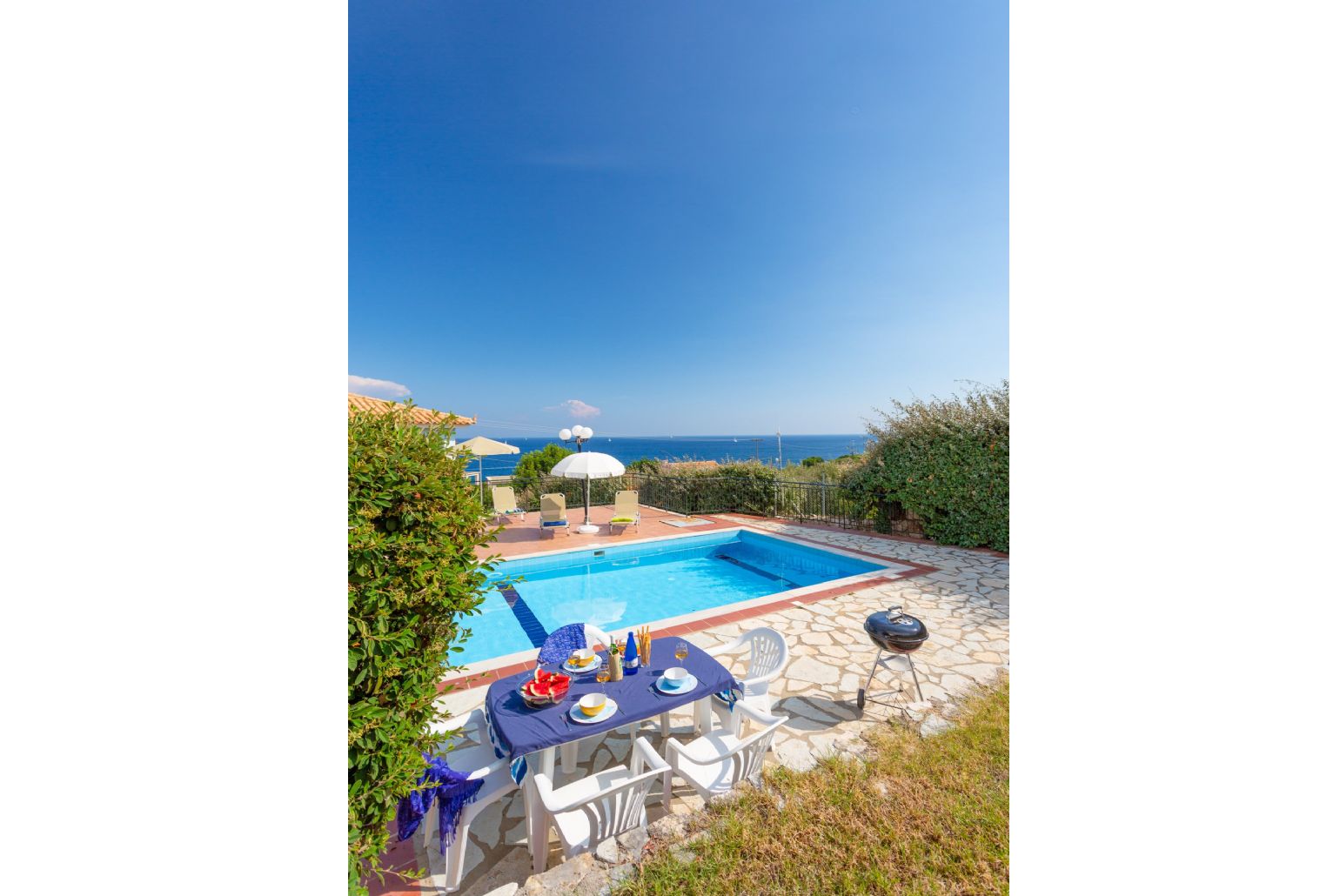 Private pool and terrace area with sea views