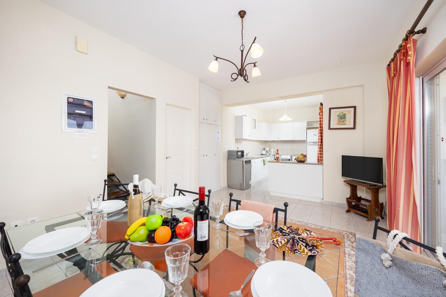 Dining room with kitchen, A/C, WiFi internet, and satellite TV