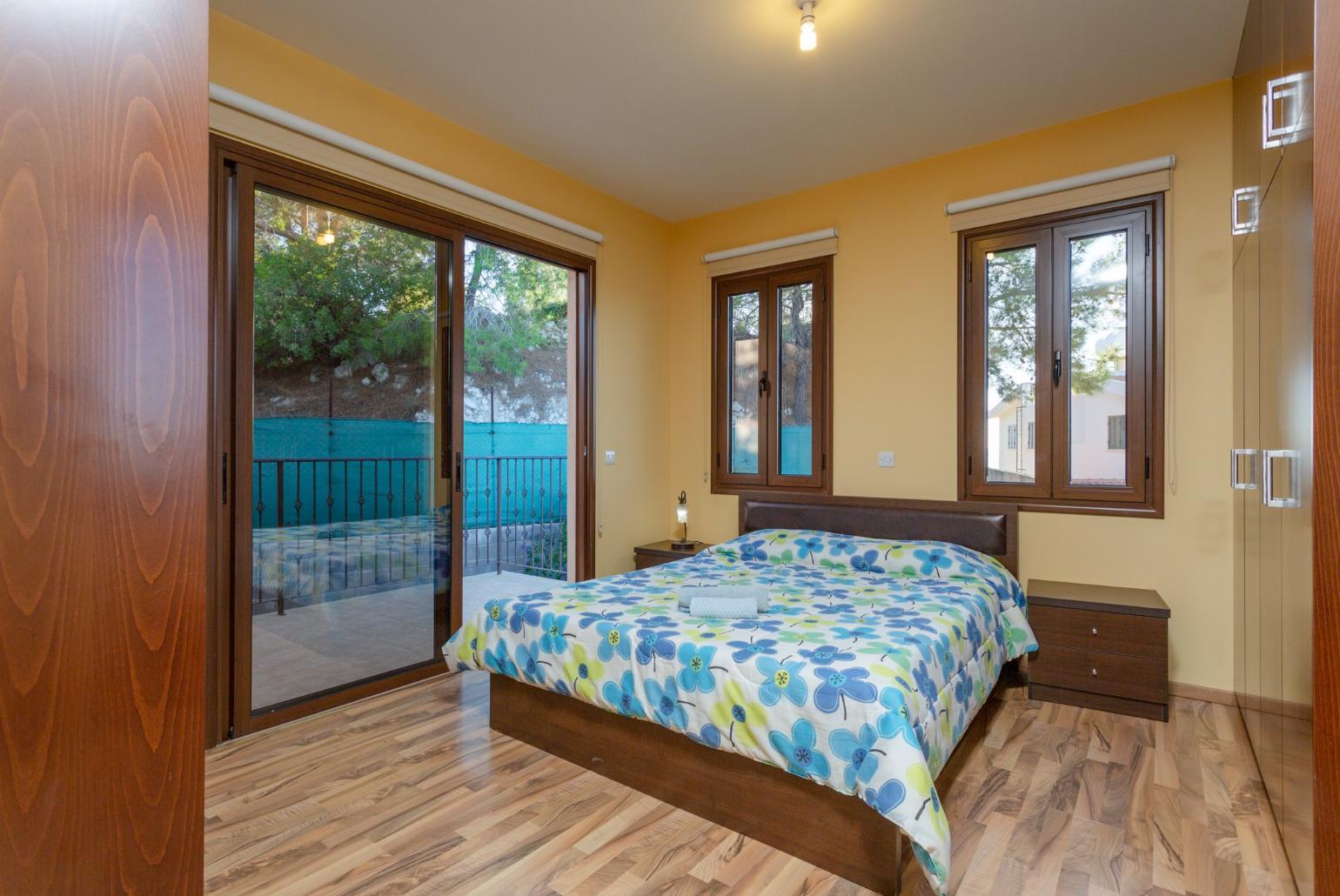 Double bedroom with en suite bathroom, A/C. and balcony access