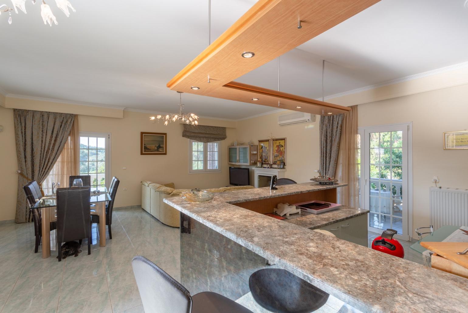  Equipped kitchen and open plan dining area.