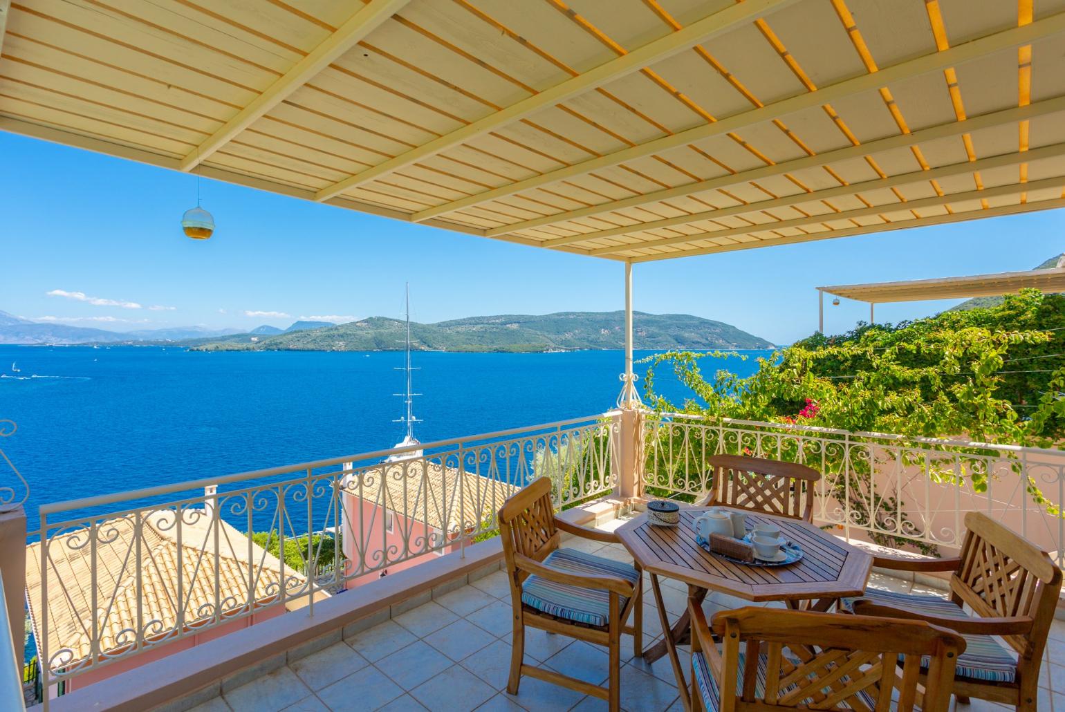 Sheltered balcony with panoramic sea views