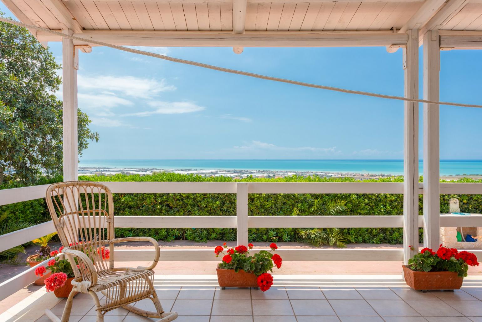 Sheltered terrace area with sea views