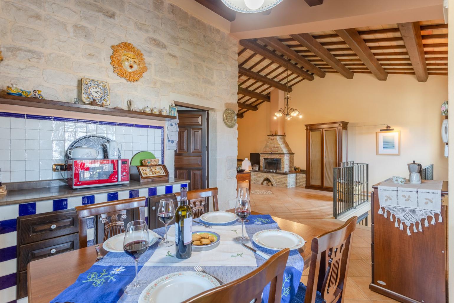 Dining area and equipped kitchen