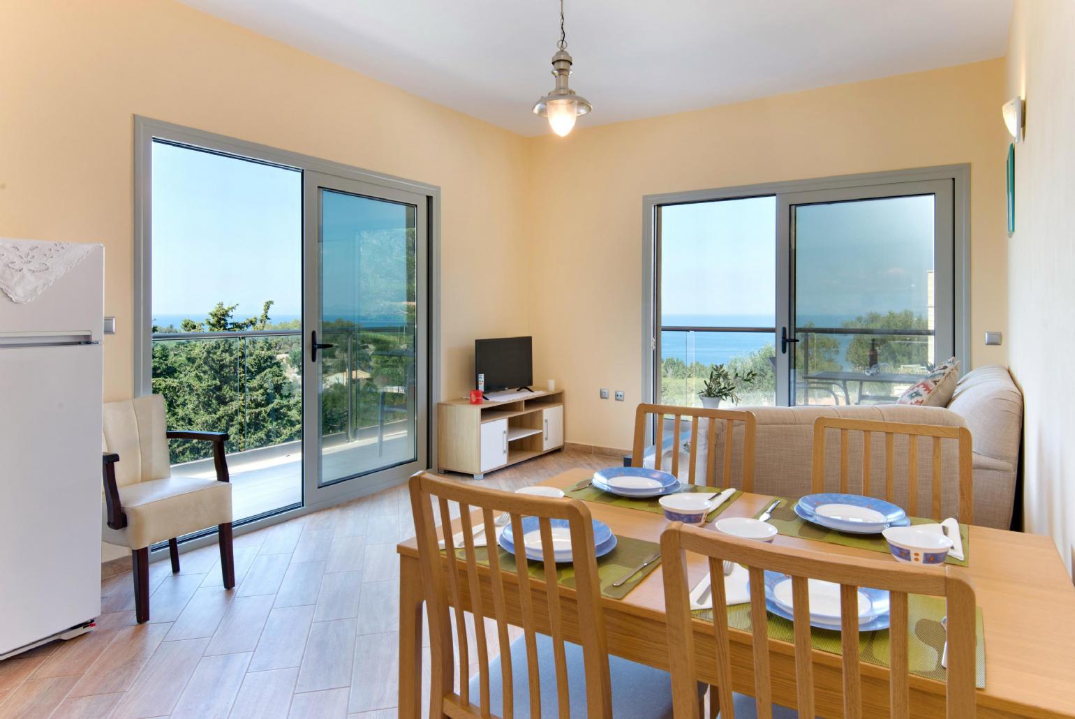 Dining area with terrace access and beautiful view