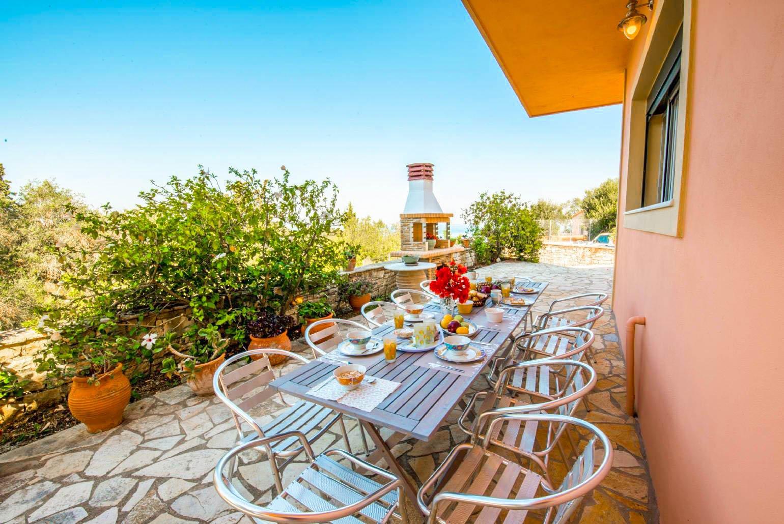 Outdoor dining area with BBQ