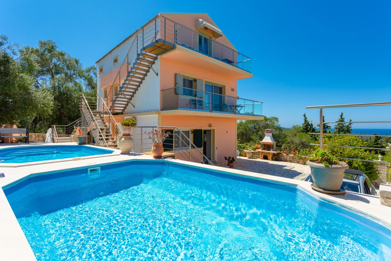 ,Beautiful villa with private pools and terrace with sea views