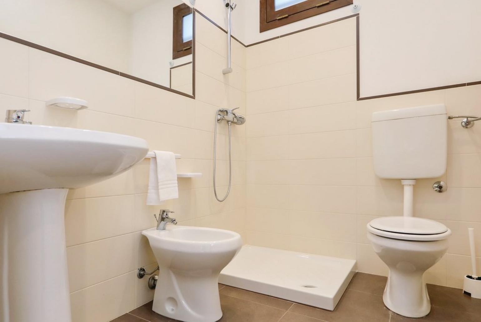 Family bathroom with shower. W/C.