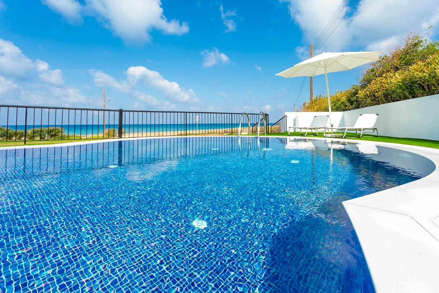 Private pool and terrace with panoramic sea views