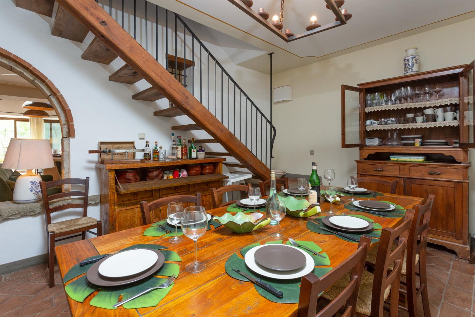 Dining room on ground floor of main building with ornamental fireplace