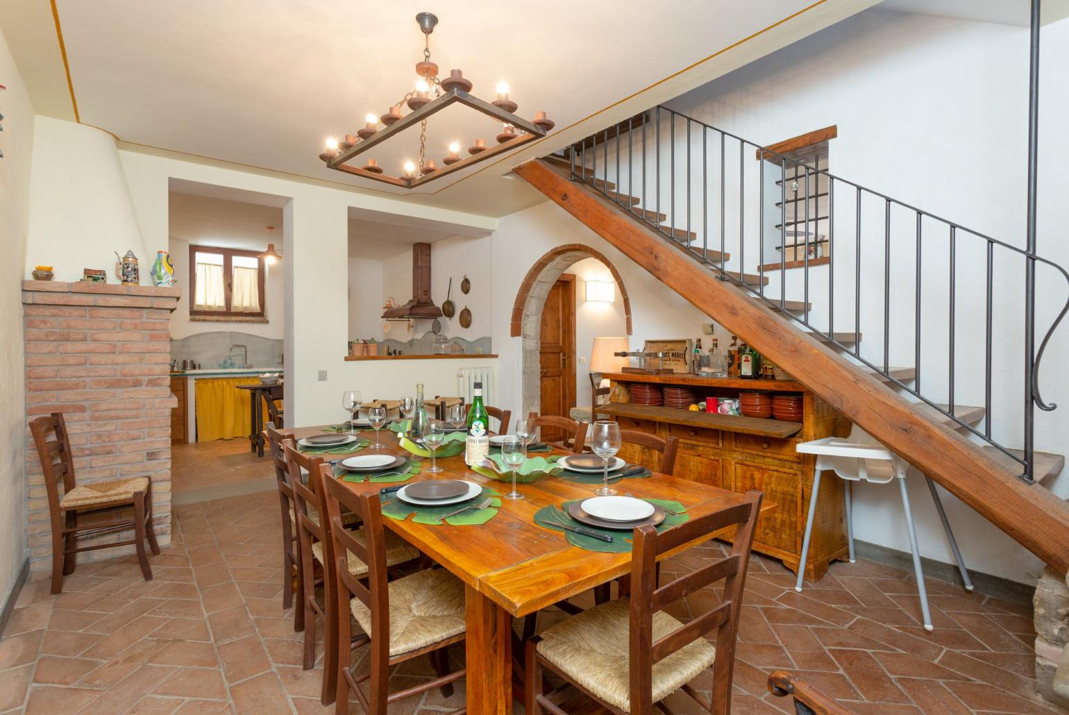 Dining room on ground floor of main building with ornamental fireplace