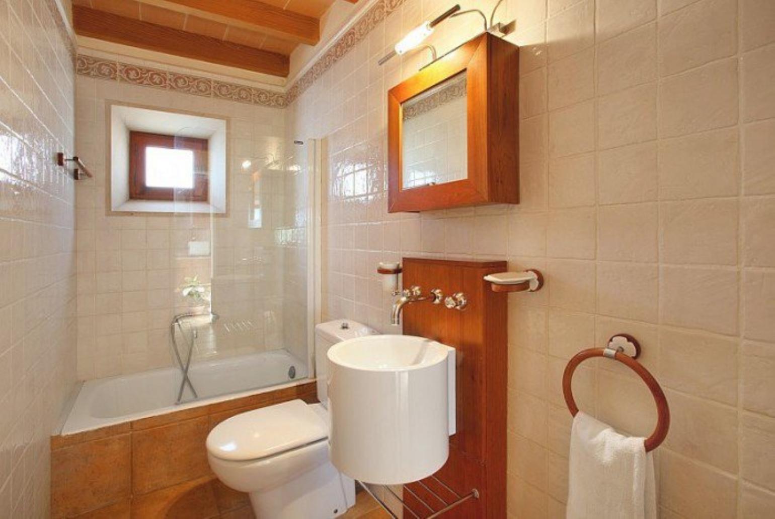 Family bathroom with bath and shower