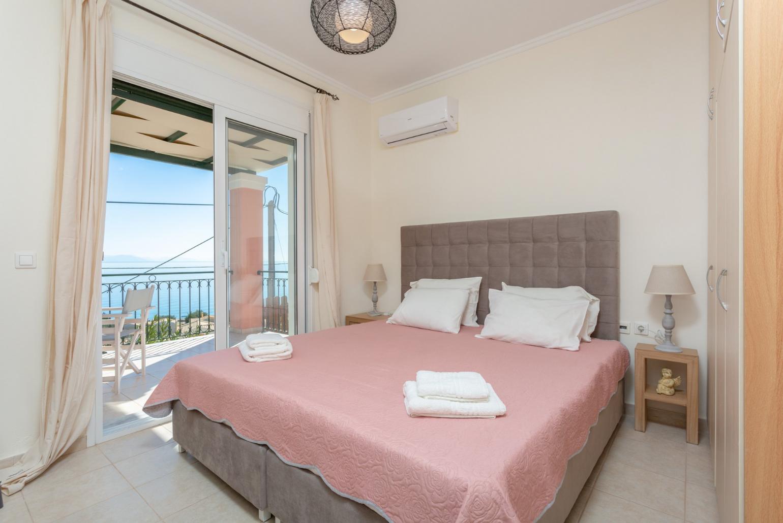 Double bedroom with A/C and terrace access with panoramic sea views