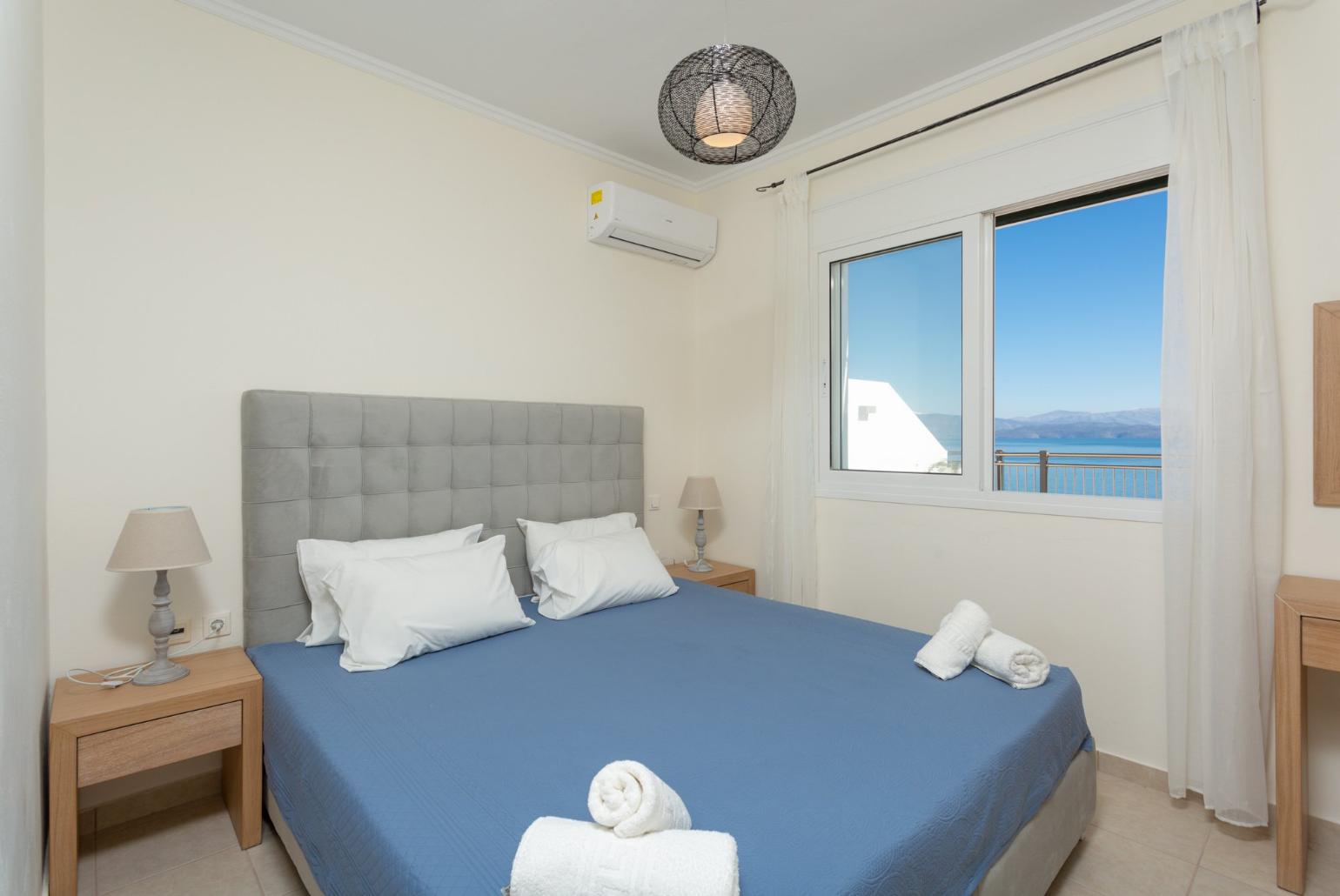 Double bedroom with A/C and pool terrace access with panoramic sea views