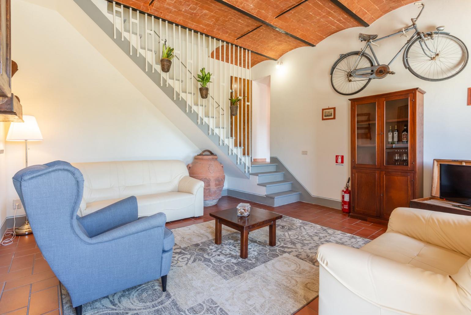 Living room with sofas, WiFi internet, satellite TV, and terrace access