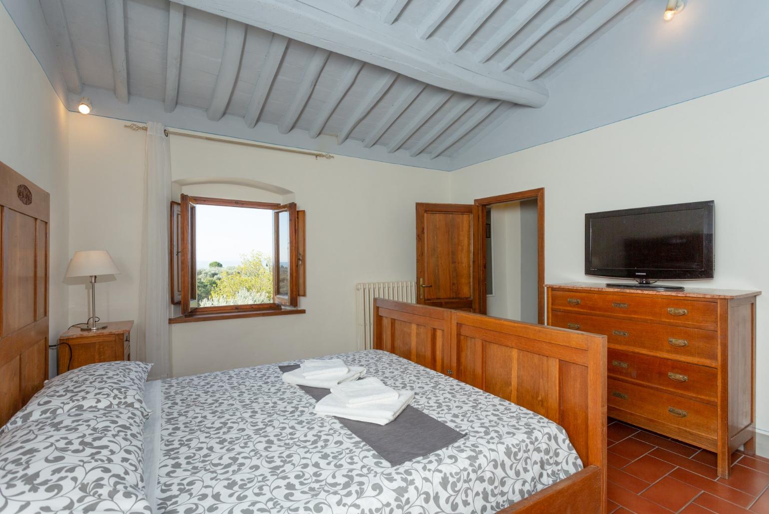 Double bedroom with satellite TV