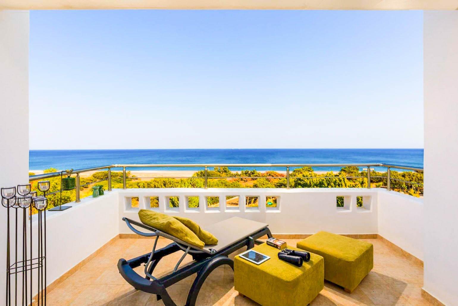 Balcony with sunbed and panoramic sea views