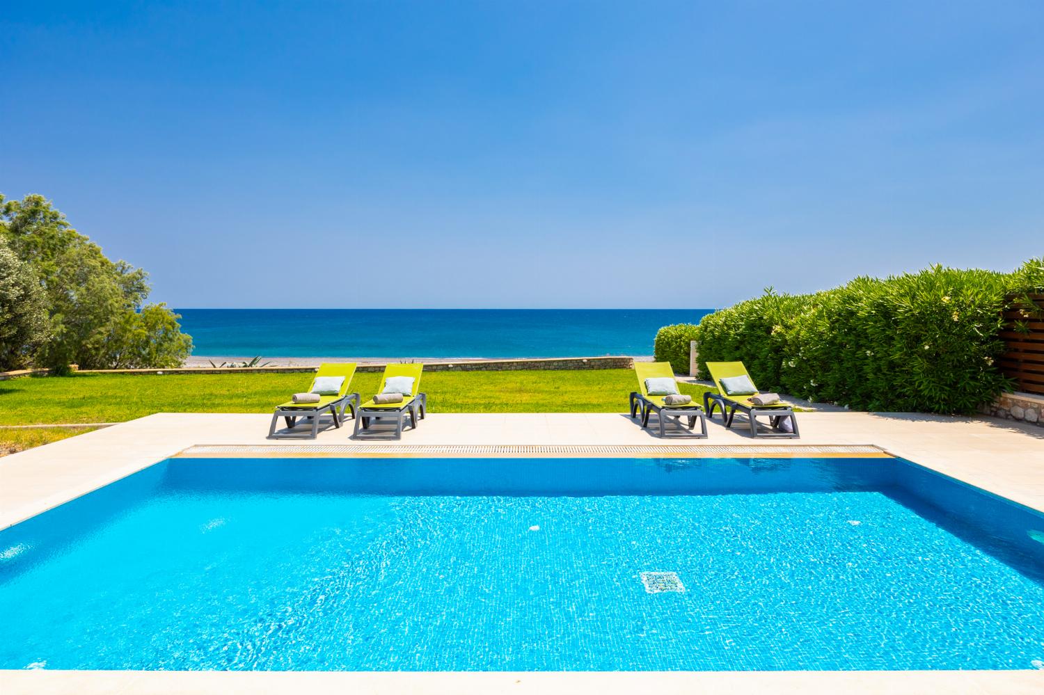 Private pool, terrace, and garden with sea views