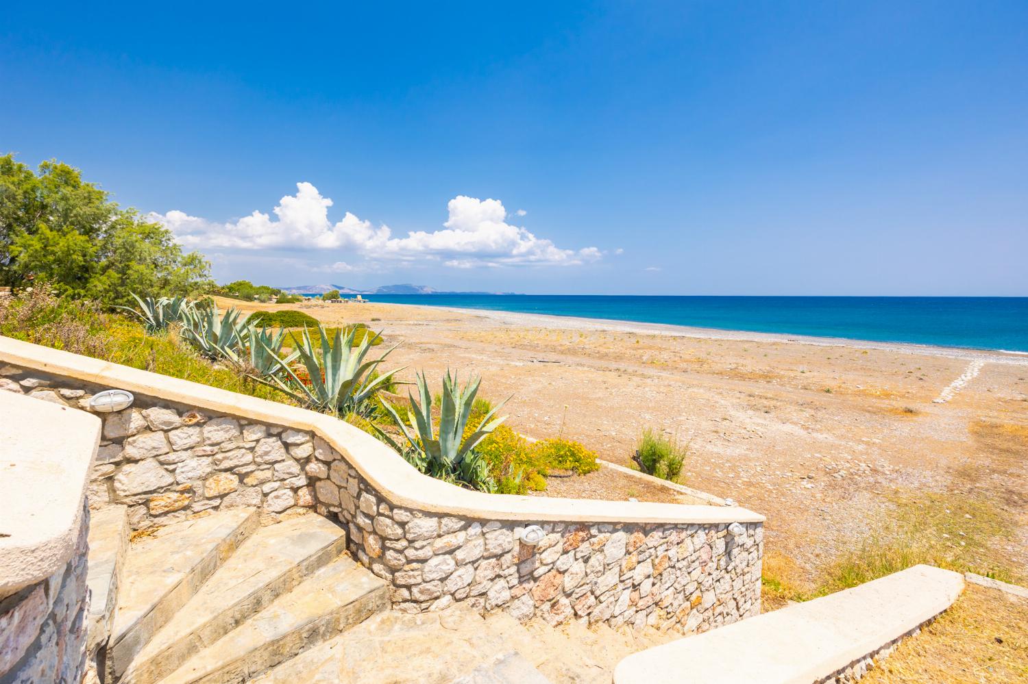 Stairs to beach in front of villa