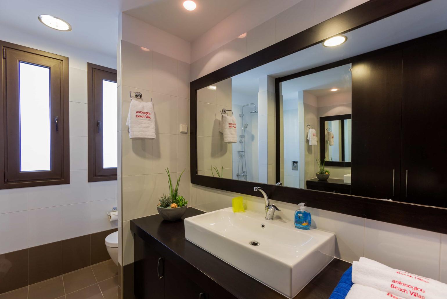 En suite bathroom with shower and WC