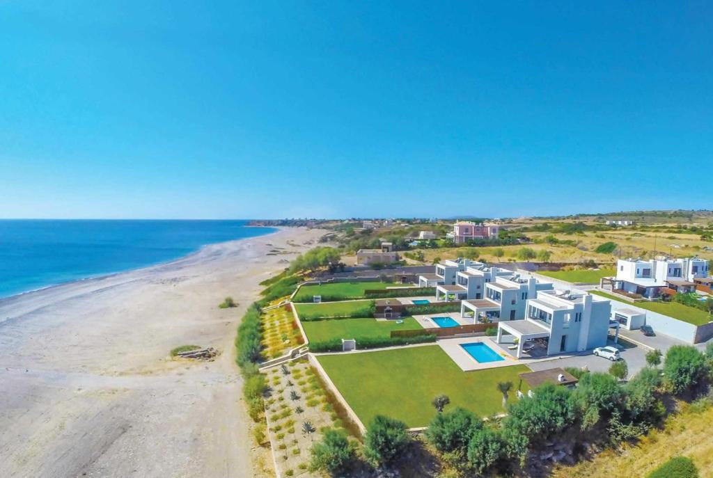 Aerial view showing the stunning location of of Villa Tsampikos