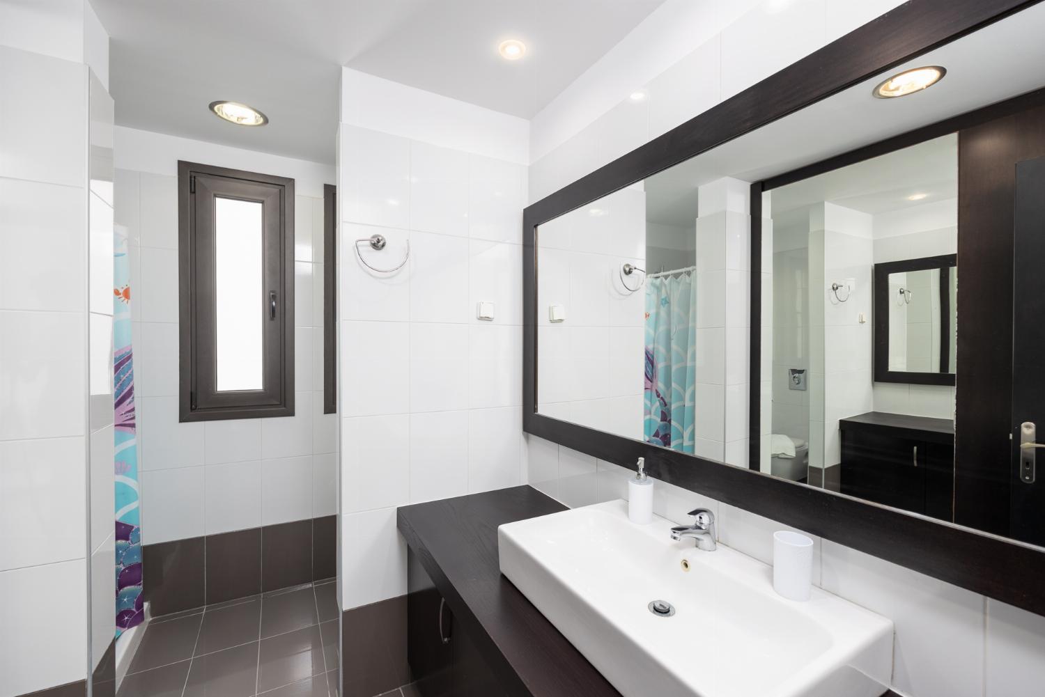 En suite bathroom with shower