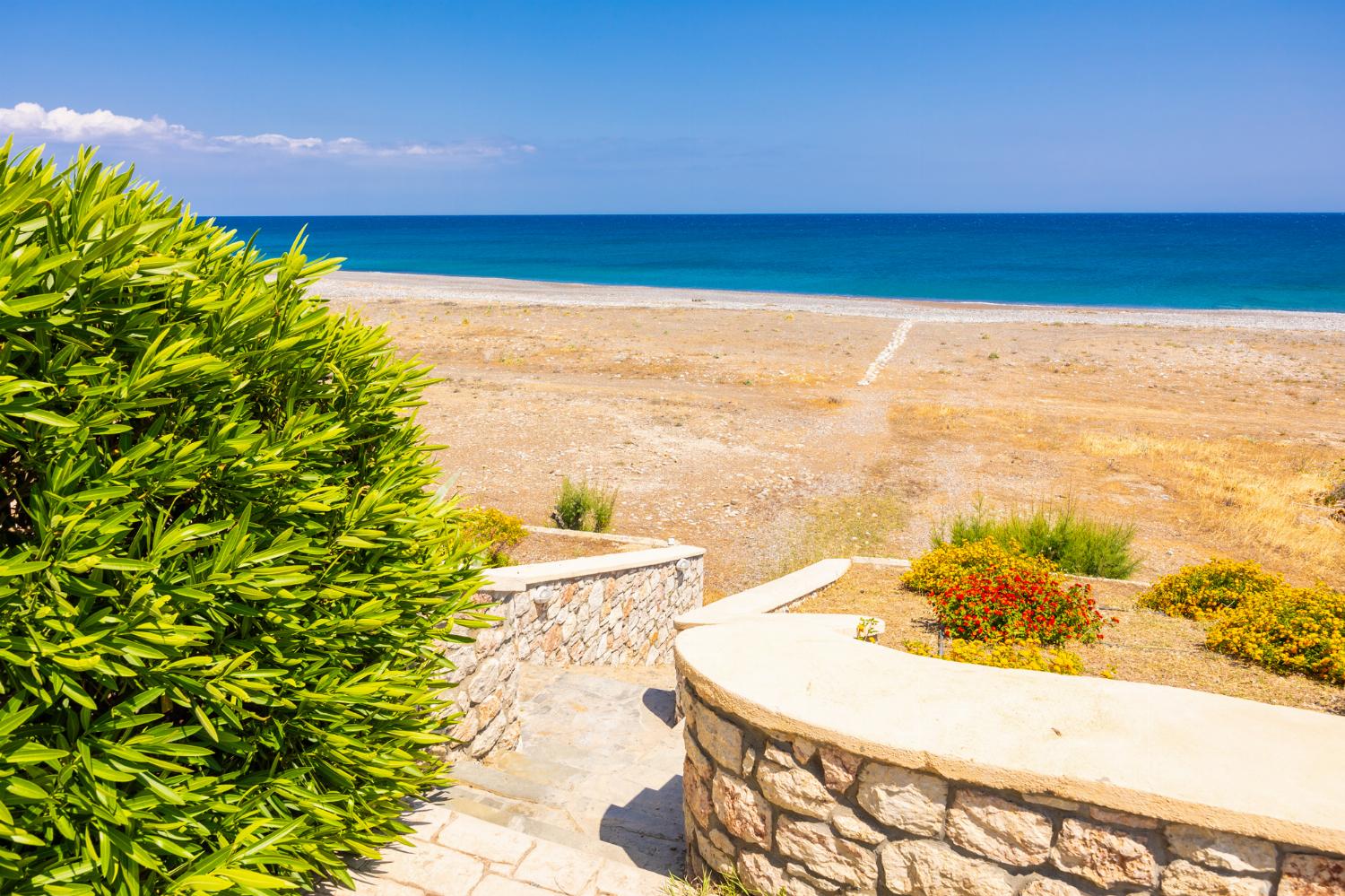 Stairs to beach in front of villa