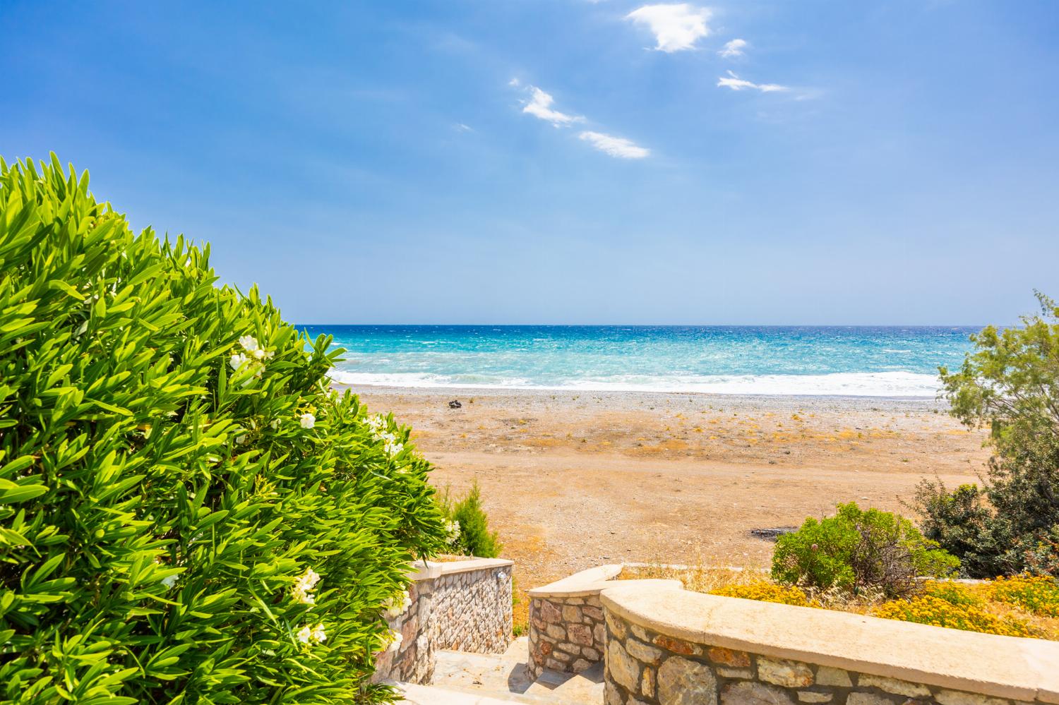 Walkway to beach in front of villa