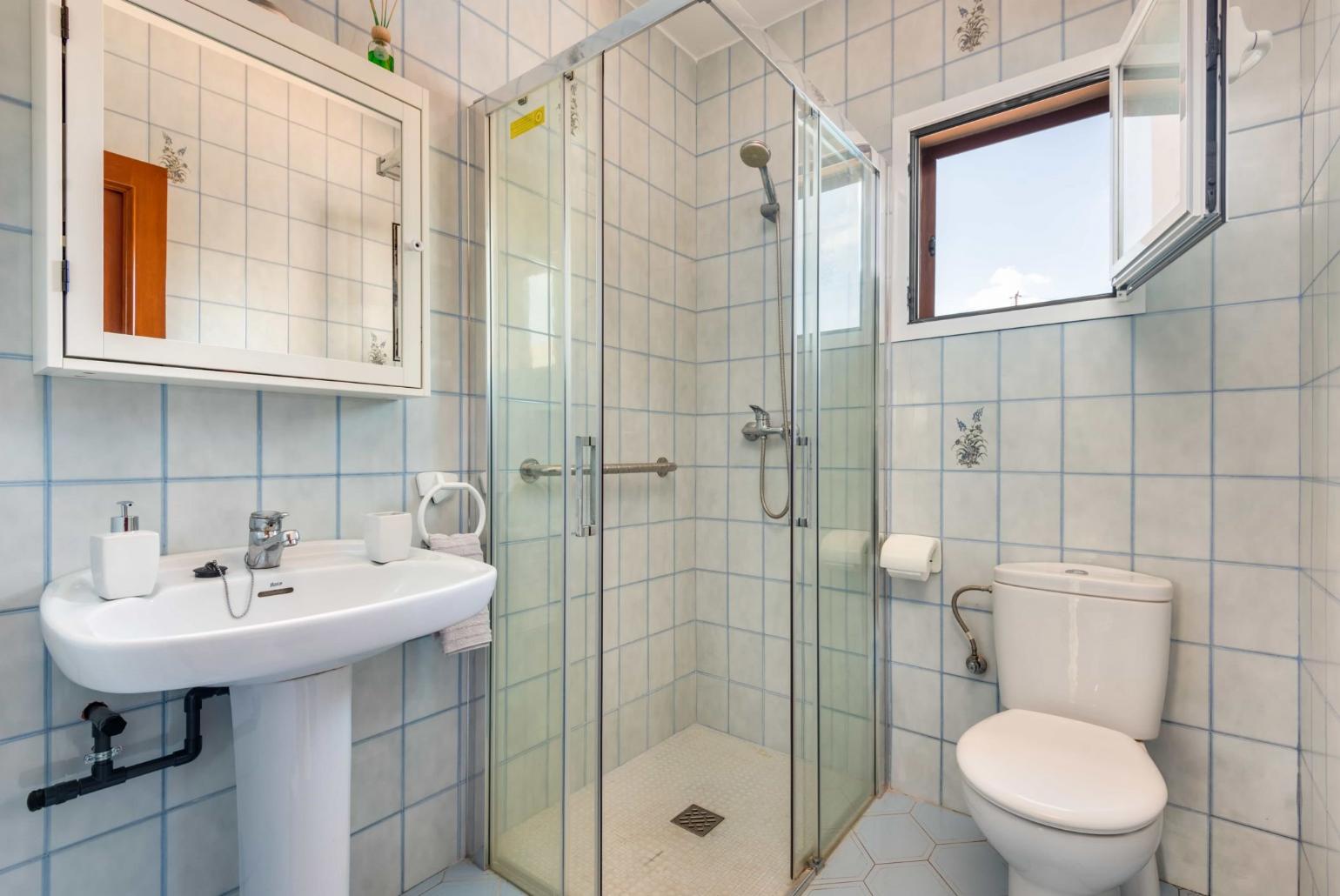 Family bathroom with shower. W/C.