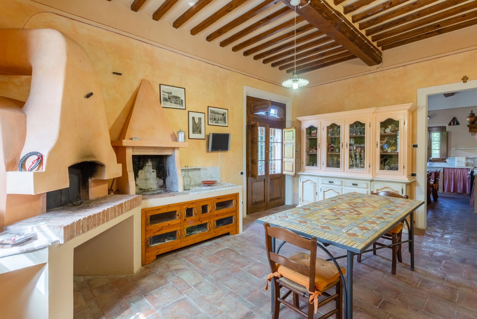 Dining room with wood-fired oven