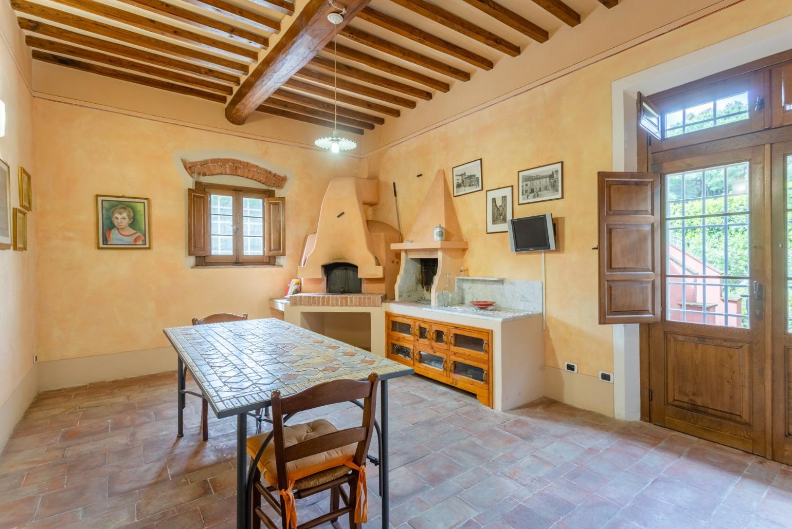 Dining room with wood-fired oven