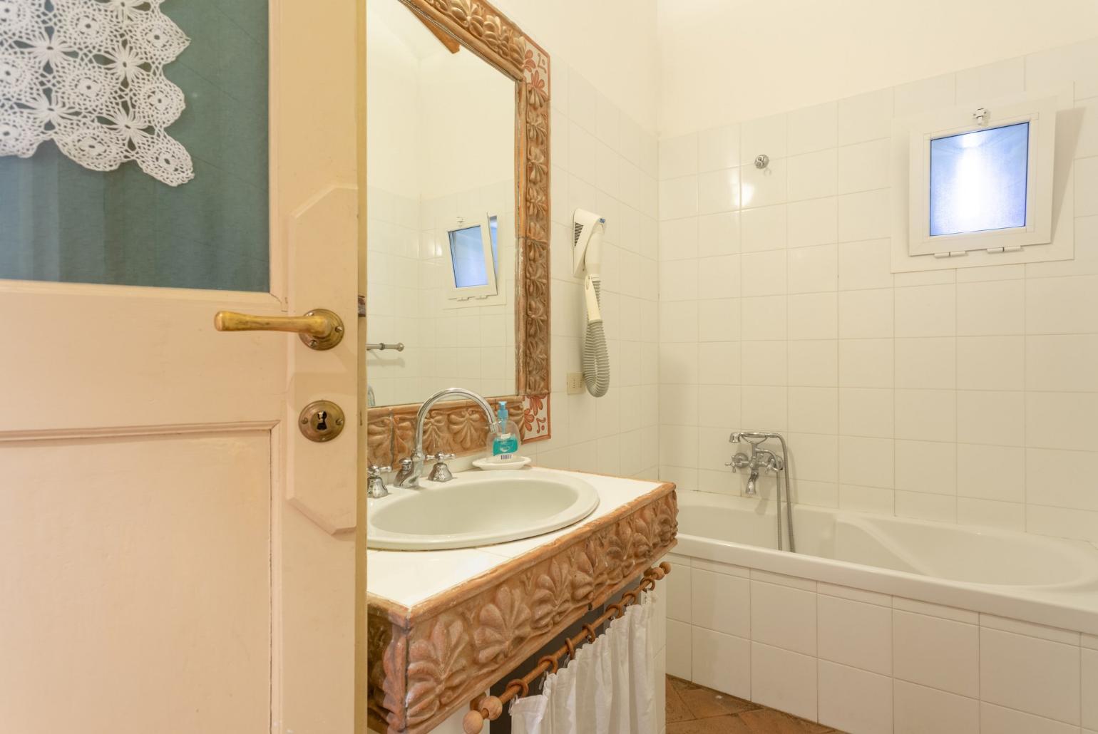 Family bathroom with bath and shower 