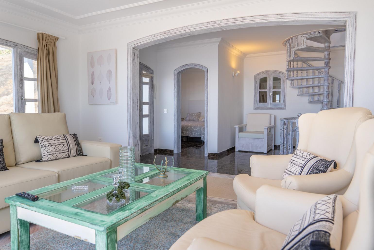 Living room with Ornamental fireplace, TV and beautiful view