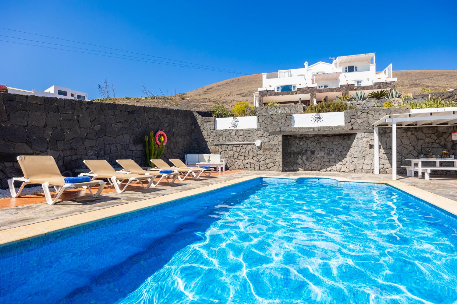 Beautiful villa with private pool, terraces, and garden with panoramic sea views