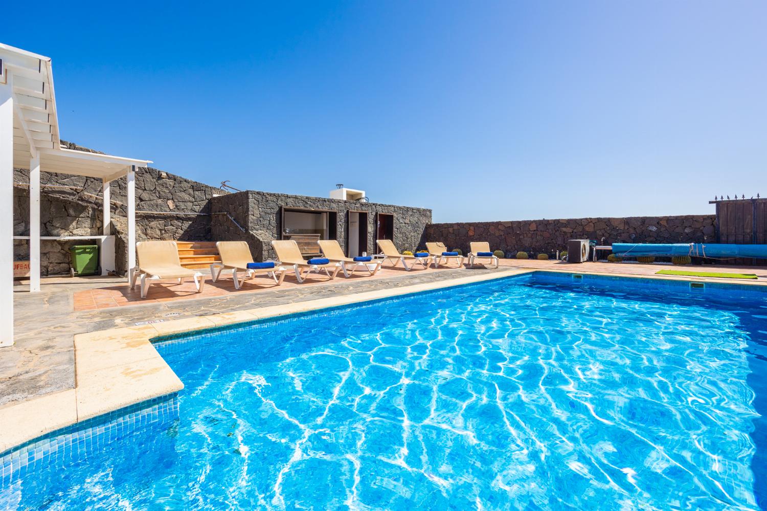 Private pool, terraces, and garden with panoramic sea views