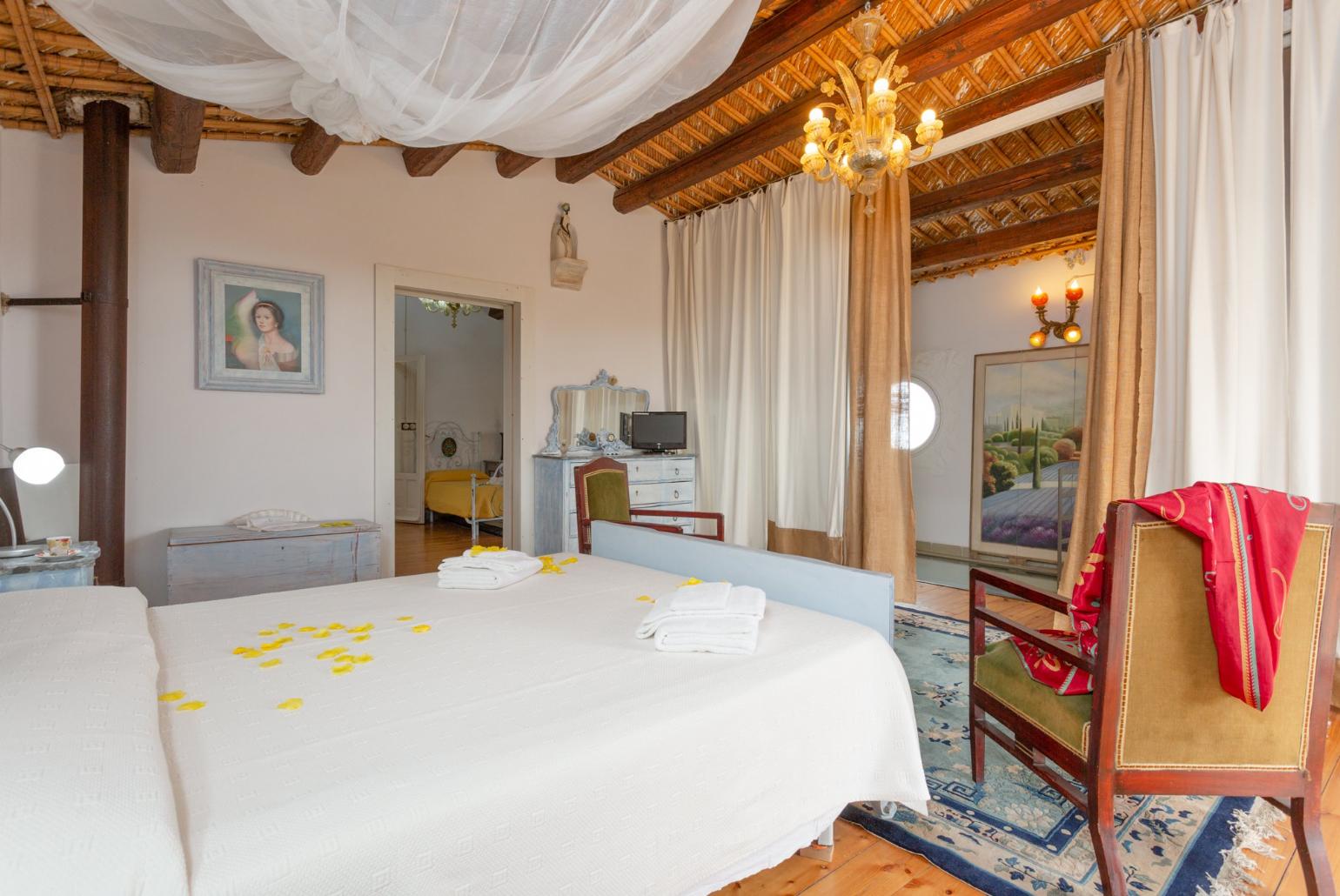 Double bedroom with A/C and balcony access
