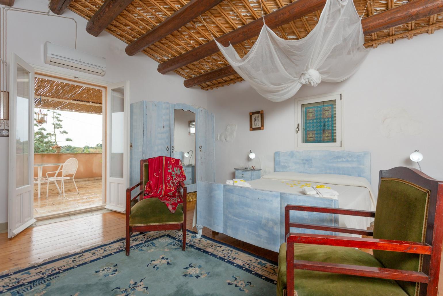Double bedroom with A/C and balcony access