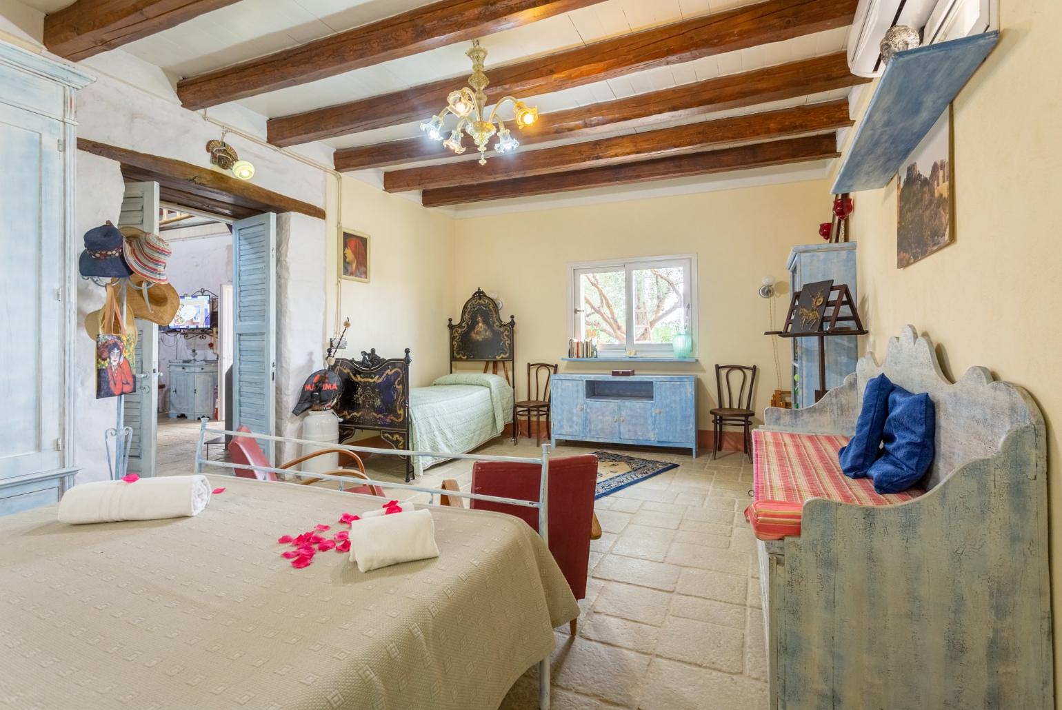 Double bedroom with extra single bed and A/C