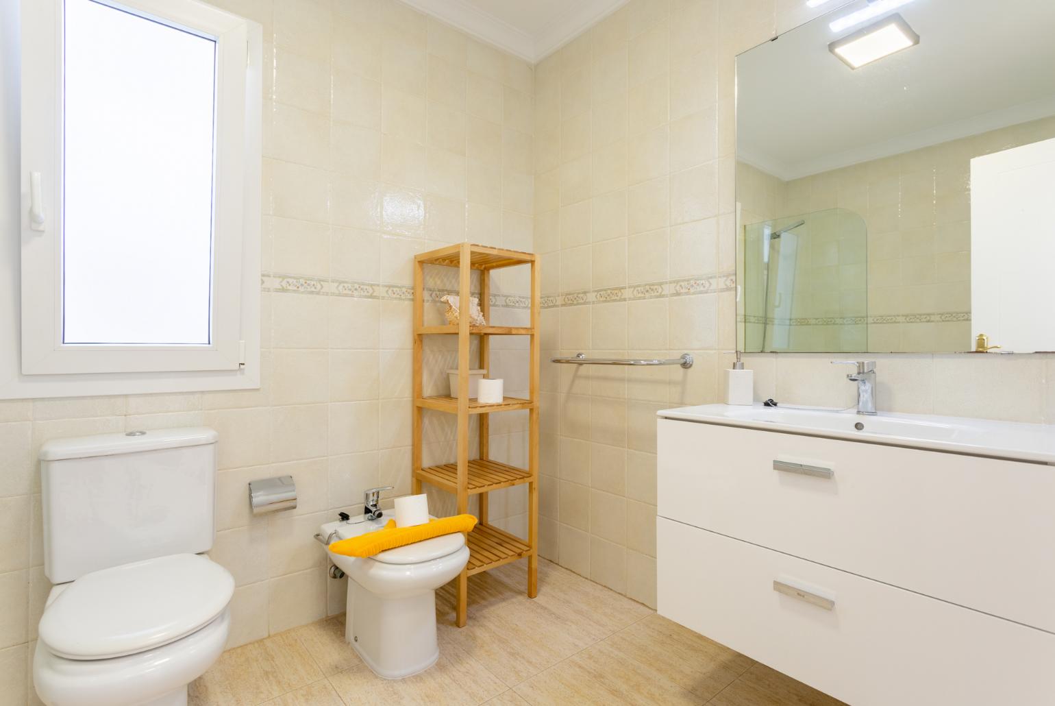 Family bathroom with bath and shower