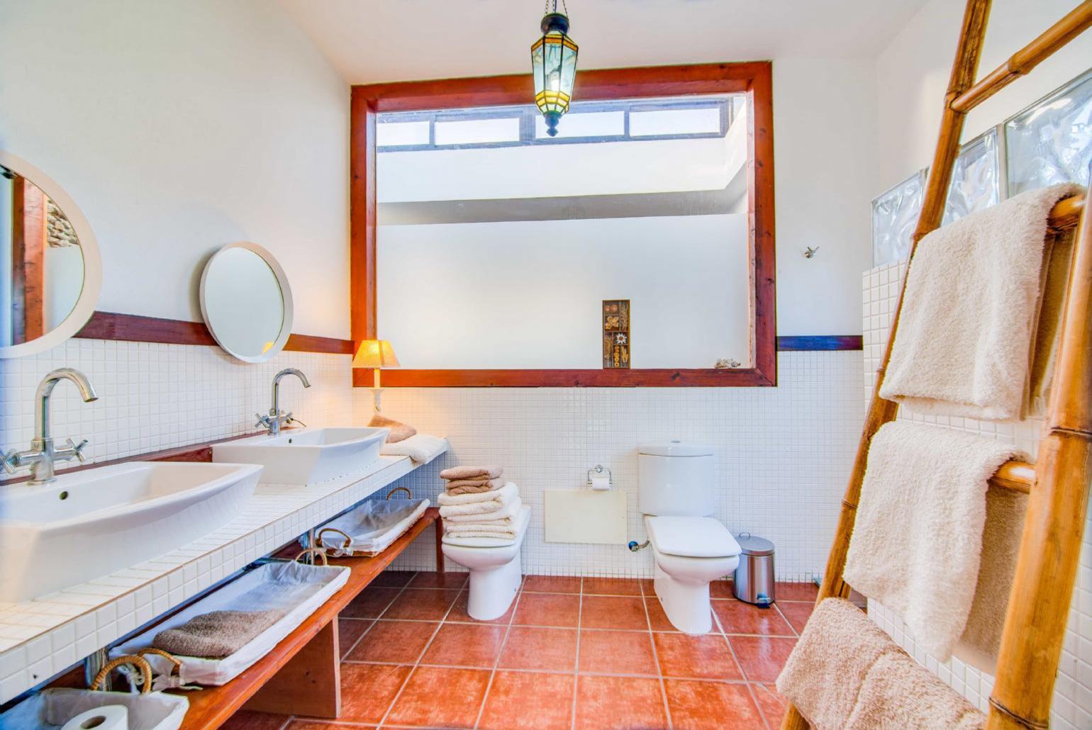 En suite bathroom with bath and shower