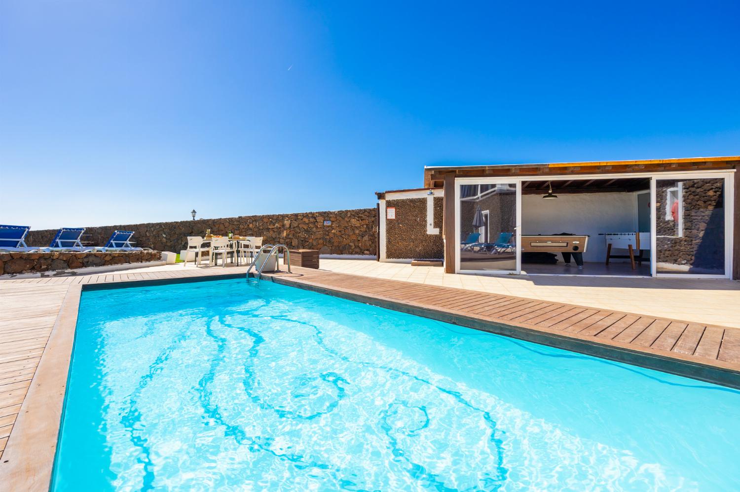 Private pool, terrace, and garden with sea views