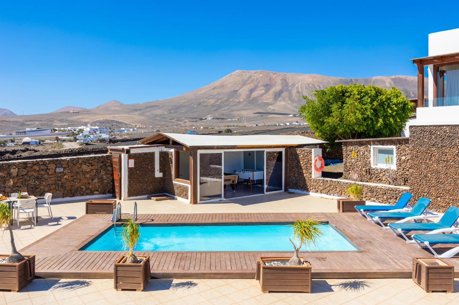 Private pool, terrace, and garden with sea views