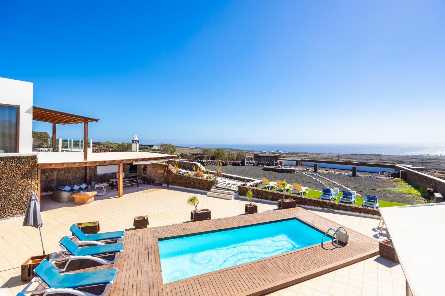 Private pool, terrace, and garden with sea views