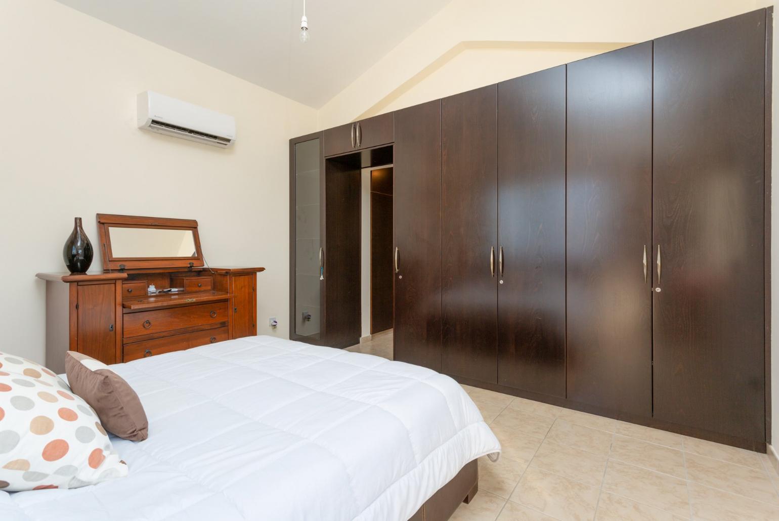 Double bedroom with en suite bathroom, A/C, and sea views