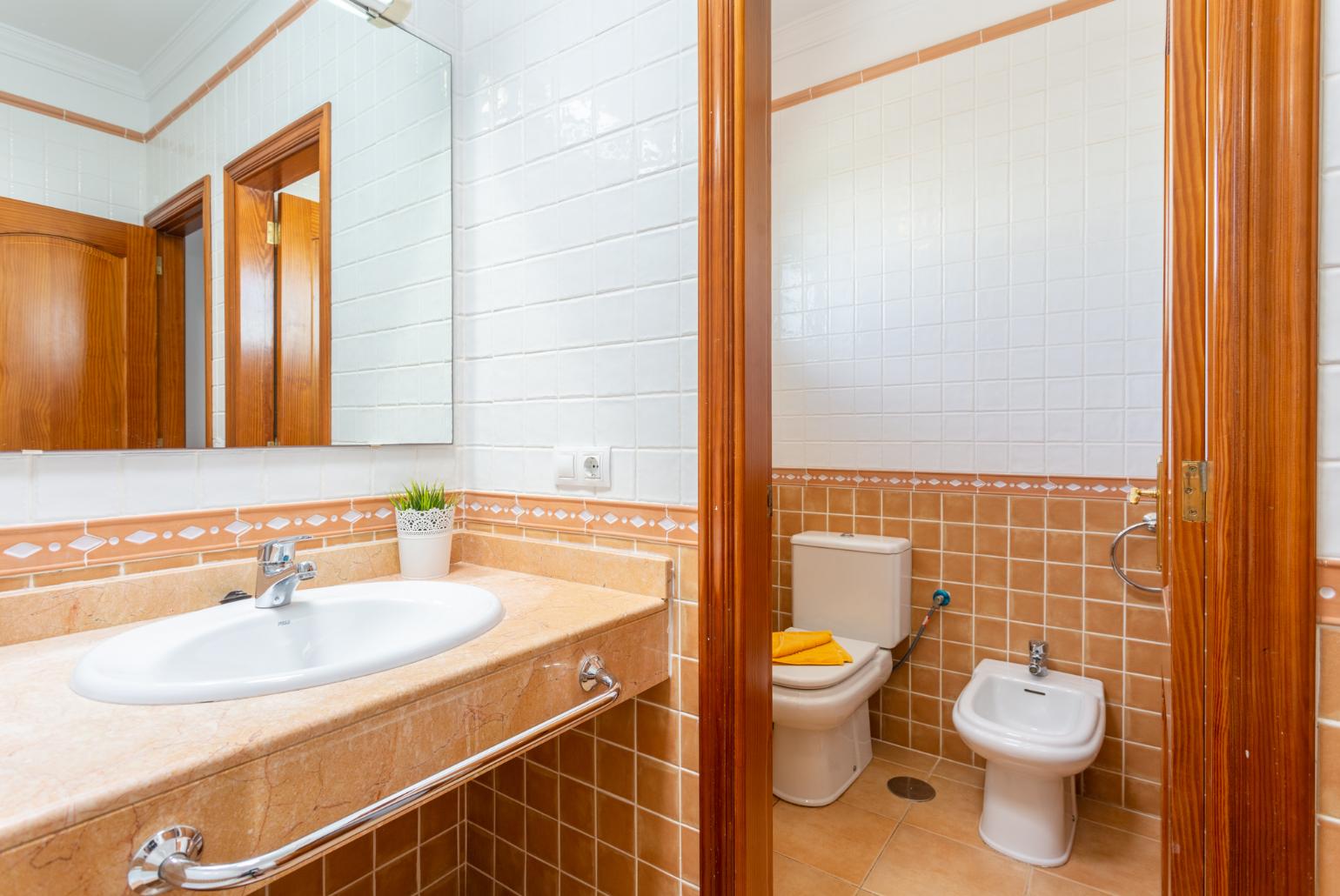 Family bathroom with bath and shower