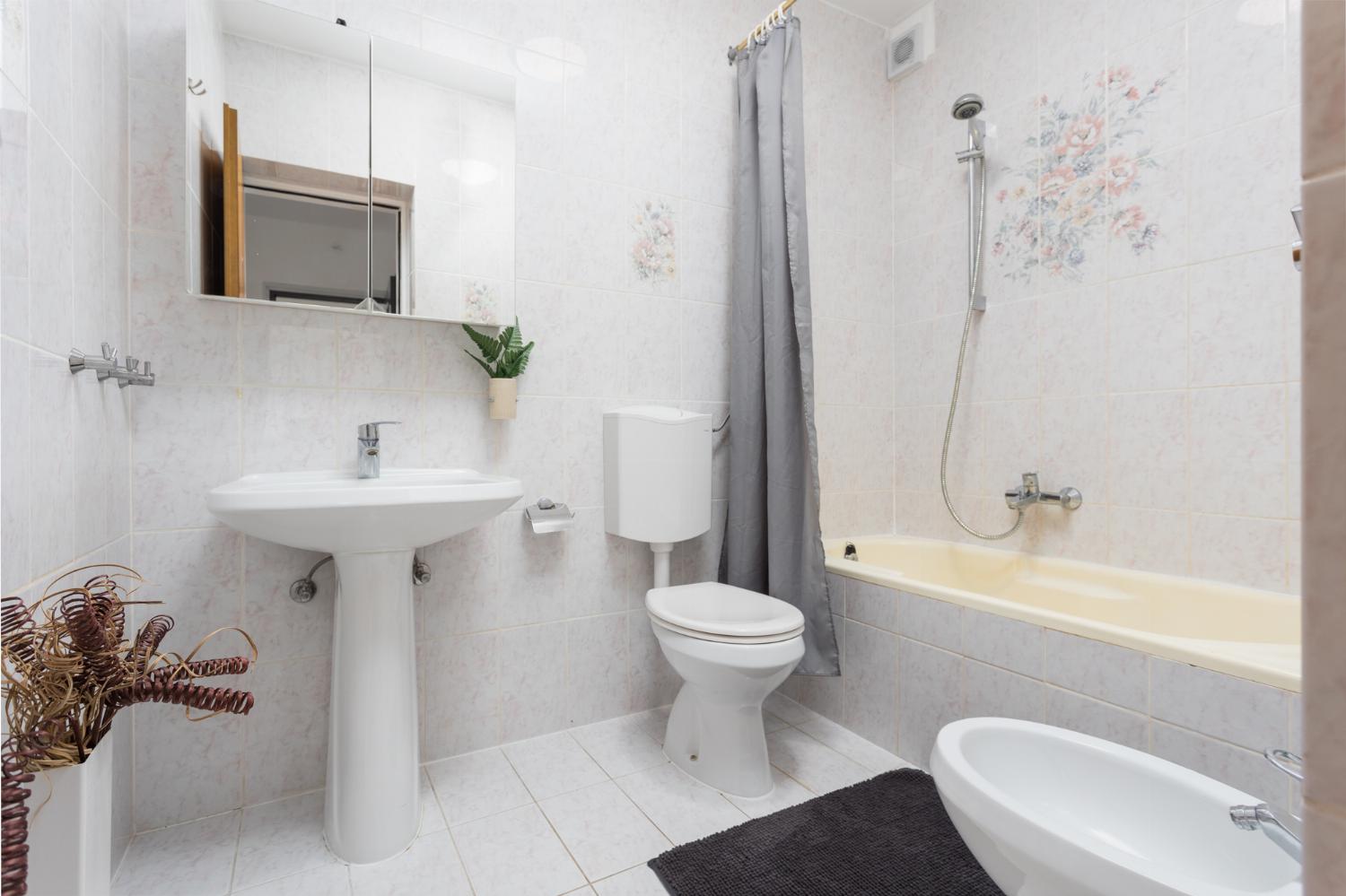 Ground floor: family bathroom with bath and shower